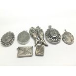 A collection of antique English silver lockets a s