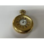An 18ct gold half Hunter gents pocket watch with a