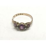 An unusual 12carat Antique gold ring set with amet