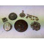 A group of small silver and white metal items including a bronze Queen Victoria medallion - NO