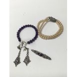 Silver earrings and a silver brooch, set with amethyst and an amethyst bangle, and one other - NO