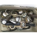 A box of mixed costume watches.