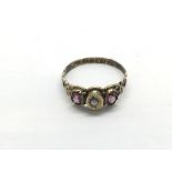 A Victorian 9ct gold garnet and pearl ring, approx