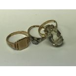 A collection of three gold rings including 18 ct w