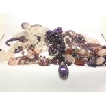 A collection of amethyst and conforming colour Vin