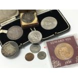 A small collection of silver coinage including an American Dollar