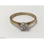 A 9ct gold ring set with a cubic zirconia stone. The approximate ring size is P - NO RESERVE