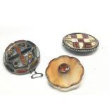 Three quality Scottish polished pebble brooches on