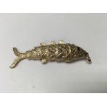 A 9 ct gold articulated fish 19.5 grams