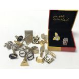 A quantity of collectible cufflinks including a boxed Moss set and a boxed Simpsons set - NO