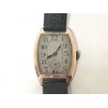 An Art Deco rose gold 9ct gents wrist watch seen working.