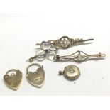 Three gold brooches set with seed pearl and Opal a