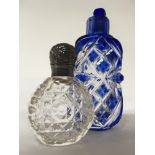 Two cut glass scent bottles, one having Victorian