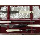 A cased Aspreys carving set.