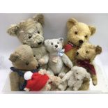 A collection of vintage teddy bears, various makes