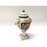 Decorative small hand painted vase with lion head mounts