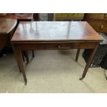 A late Victorian mahogany breakfast table with reeded legs.