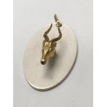 An African ivory plaque, mounted with a gold plated springbok - NO RESERVE