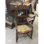 A Victorian mahogany and beechwood rocking chair.