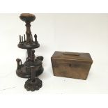A 19th century treen bobbin holder and a 19th century tea caddy (2)