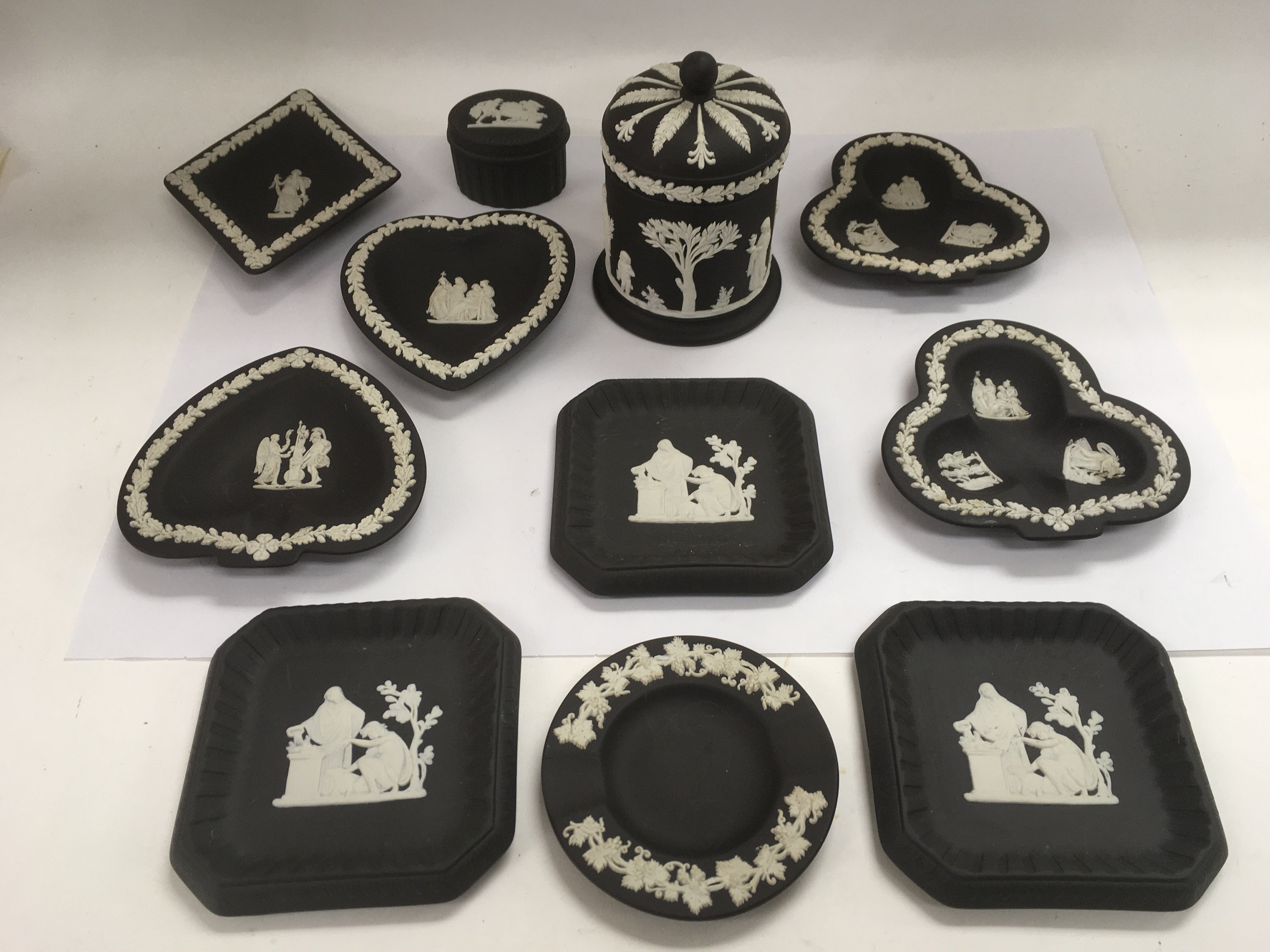 A collection of Wedgwood jasperware black basalt items.