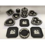 A collection of Wedgwood jasperware black basalt items.