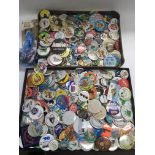 A collection of vintage badges.