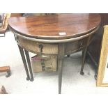 A George III style side table with a hinged oval top above a small drawer. 76cm. Wide