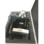 A modern Apex microscope fitted for electric in a fitted traveling case - NO RESERVE