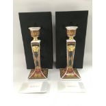 A pair of boxed Rosenthal Versace candlesticks, ap