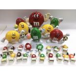 A collection of M&M plastic figures.