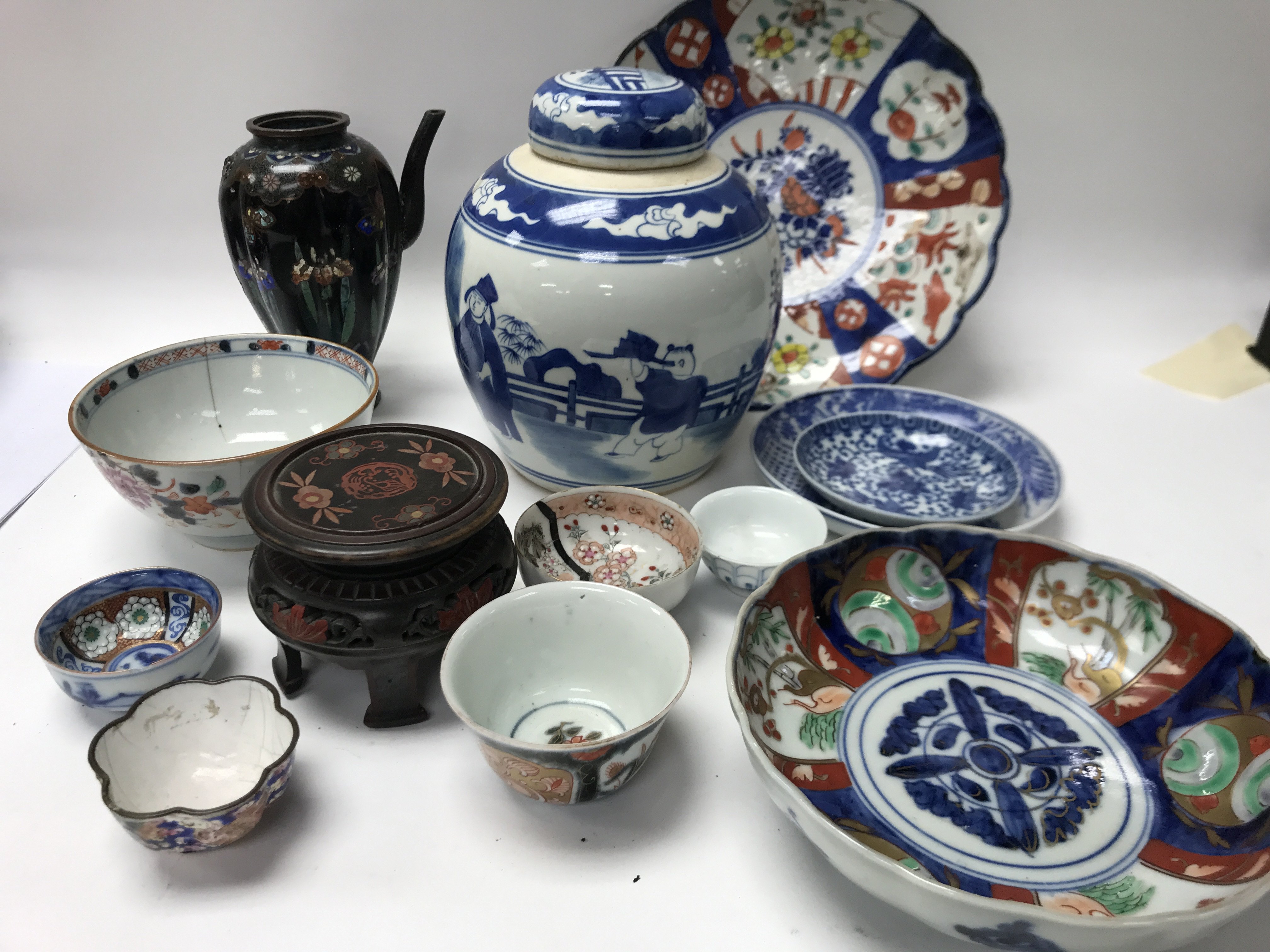 A collection of Japanese and Chinese ceramics incl