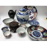 A collection of Japanese and Chinese ceramics incl