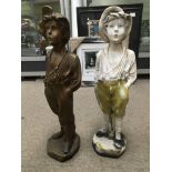 Two plaster figures of the whistling boy, approx h