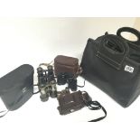 A collection of binoculars and cameras and a camera bag (a lot) - NO RESERVE