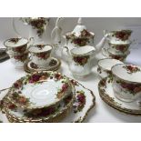 A royal Albert country rose tea coffee service including cups saucers jug coffee/ tea pot .