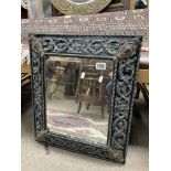 A Victorian ornate metal overlaid mirror x