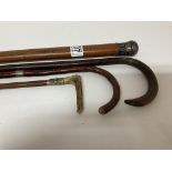 4 vintage walking canes/sticks.