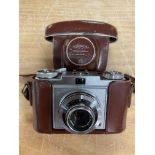 A cased Zeiss Ikon prontor SVS camera