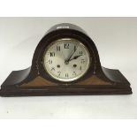 An early 20th century inlaid mahogany mantel clock with a silvered dial - NO RESERVE