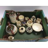 A collection of fourteen Torquay ware items.