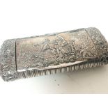 A white metal late 19th century snuff box decorate