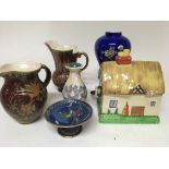 A Collection of crown Devon and Carlton ware ceramics including a biscuit barrel and jugs - NO