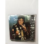 A bag containing record including Michael Jackson picture disk set, Fleetwood Mac and ELO - NO