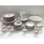 A Minton dinner and coffee service in Minton Rose pattern A4807.
