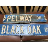 Two reproduction American street signs and five re