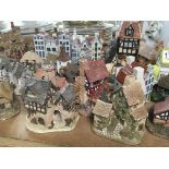 A collection of unboxed Lilliput Lane Cottages Coalport cottages and delft type cottages (a lot)