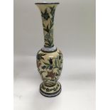 A Victorian Doulton Minna Crawley vase decorated with Flowers and foliage in the Persian style 28 cm
