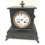 A Victorian black slate Mantel clock with a white