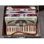 A vintage 1960s Galanti piano accordion and case.